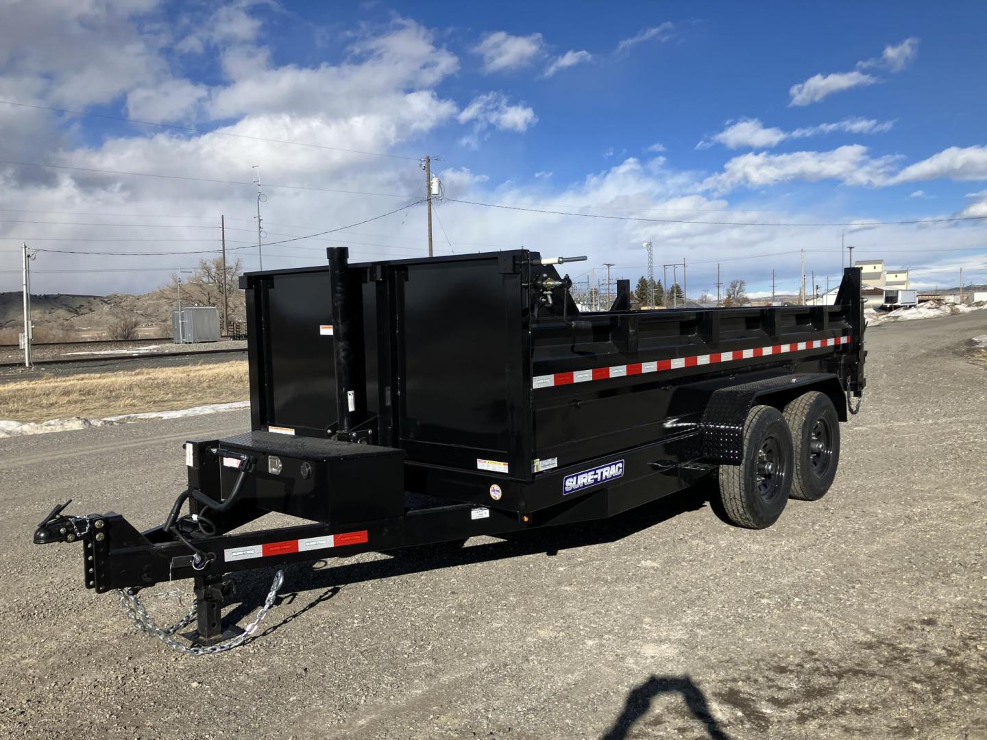 2025 Black SureTrac 7 x 14 LoPro Dump , located at 310 West 1st Ave, Big Timber, MT, 59011, (406) 860-8510, 45.833511, -109.957809 - SURE-TRAC 7 x 14 HD LO PRO DUMP TRAILER, 14K GVW, TELESCOPIC HOIST, UNDERBODY TOOL STORAGE BOX, STAKE POCKETS ON SIDE, MESH TARP, 110 VOLT BATTERY CHARGER, SIDE STEP, EZ LUBE HUBS, HD SLIPPER SPRING SUSPENSION, 16" RADIAL 10 PLY TIRES, BRAKES BOTH AXLES, SPREADER-BARN DOOR REAR GATE, REAR RAMPS, 10 - Photo#0