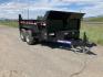 2025 Black SureTrac 6 x10 Lo Pro Dump Trailer , located at 310 West 1st Ave, Big Timber, MT, 59011, (406) 860-8510, 45.833511, -109.957809 - SURE-TRAC 6 X 10 LO PRO DUMP TRAILER, 10K GVW, SINGLE RAM HOIST WITH POWER UP/DOWN, EZ LUBE HUBS, DUAL REAR GATE, ELECTRIC BRAKES BOTH AXLES, (5) D-RING TIE-DOWNS, LED LIGHTS, REAR STOW RAMPS, MESH TARP, DEEP CYCLE BATTERY, 225-15" - 8 PLY RADIAL TIRES, SPARE TIRE CARRIER, 7K DROP FOOT JACK, LOCKABL - Photo#1