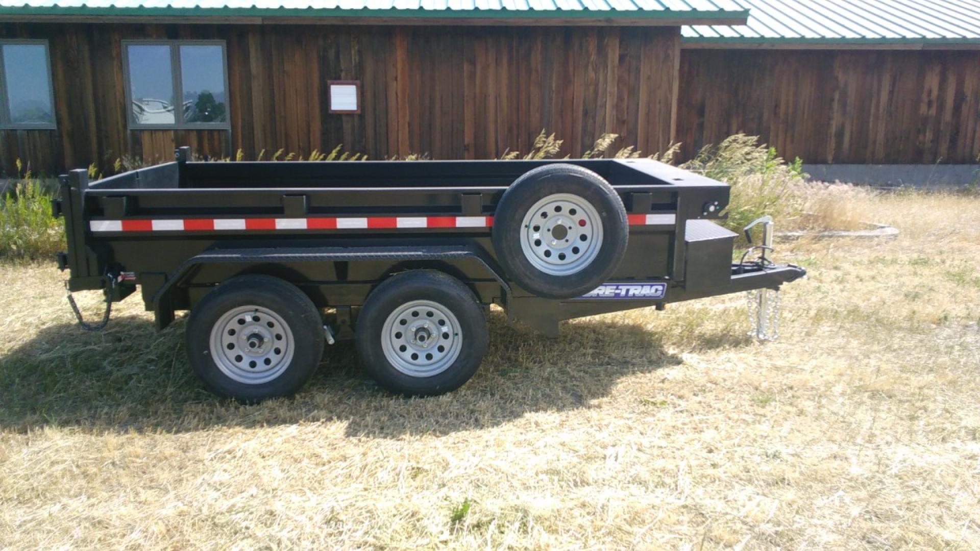 2024 Black SureTrac 5 x 10 LoPro Dump , located at 310 West 1st Ave, Big Timber, MT, 59011, (406) 860-8510, 45.833511, -109.957809 - SURE-TRAC 5 X 10 LO PRO DUMP TRAILER, 7K GVW, EZ LUBE AXLES, SINGLE RAM HOIST, DUAL REAR GATE, LED LIGHTS, 15" RADIAL TIRES, (5) D-RING TIE-DOWNS, POWDER COAT FINISH. DEEP CYCLE BATTERY, BATTERY CHARGER, MESH TARP. OPTIONS: SPARE TIRE - $150.00. THE BEST TRAILERS AT THE BEST PRICE!!! Pi - Photo#5