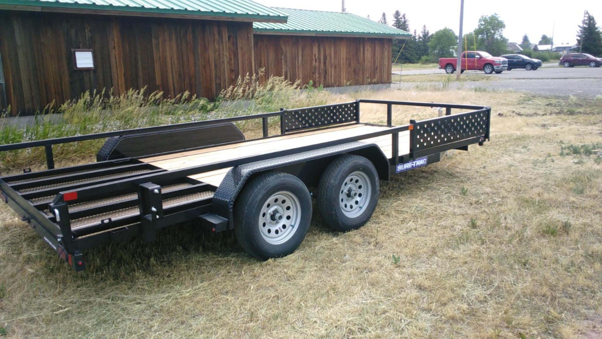 2025 Black SureTrac 7 x 16 Utility ATV , located at 310 West 1st Ave, Big Timber, MT, 59011, (406) 860-8510, 45.833511, -109.957809 - SURE-TRAC 7 X 16 TUBE TOP ATV, 7K GVW, SIDE AND REAR RAMPS, 15" RADIAL TIRES, BRAKES BOTH AXLES, EASY LUBE HUBS, LED LIGHTS, TREATED WOOD DECK, POWDER COAT FINISH, WIRING RUN IN CONDUIT, STAKE POCKETS, SPRING ASSIST REAR RAMP, SPARE TIRE MOUNT. OPTION: Spare Tire - $150.00. THE BEST TRAILERS AT - Photo#1