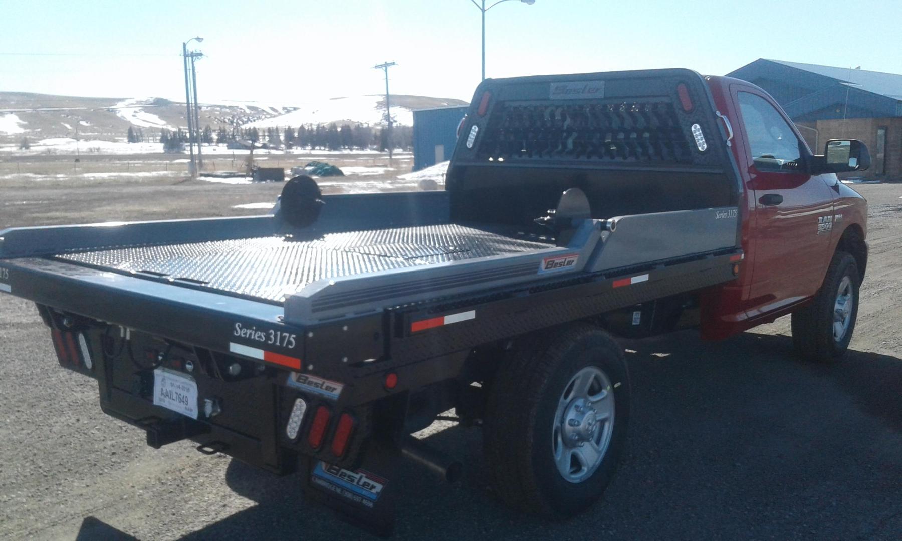 2025 Black Besler 3125 , located at 310 West 1st Ave, Big Timber, MT, 59011, (406) 860-8510, 45.833511, -109.957809 - BESLER ROUND BALE LOADER-FEEDER - 7 GPM ENGINE DRIVEN HYDRAULIC PUMP or 12 VOLT ELECTRIC/HYD POWER UNIT AVAILABLE. STANDARD FEATURES: SYNCHRONIZED PIVOT ARM OPERATION, DUAL LIFT CYLINDERS, 30K GN HITCH, LED LIGHTS, 11 GA DECK, 7 ROUND TRAILER PLUG, REAR RECEIVER HITCH, RUB RAIL, STAKE POCKETS, SID - Photo#0