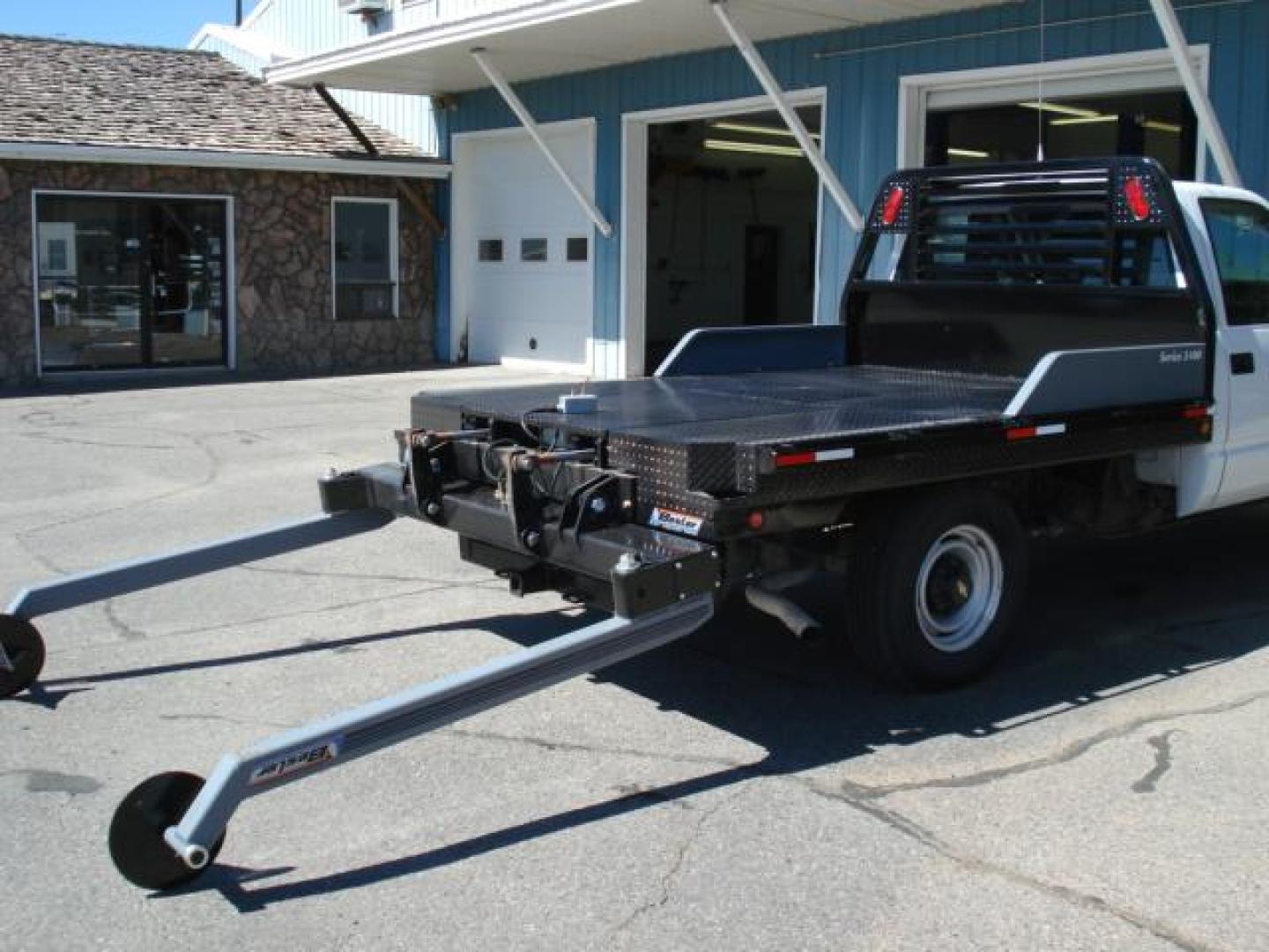 2025 Black Besler 3125 , located at 310 West 1st Ave, Big Timber, MT, 59011, (406) 860-8510, 45.833511, -109.957809 - BESLER ROUND BALE LOADER-FEEDER - 7 GPM ENGINE DRIVEN HYDRAULIC PUMP or 12 VOLT ELECTRIC/HYD POWER UNIT AVAILABLE. STANDARD FEATURES: SYNCHRONIZED PIVOT ARM OPERATION, DUAL LIFT CYLINDERS, 30K GN HITCH, LED LIGHTS, 11 GA DECK, 7 ROUND TRAILER PLUG, REAR RECEIVER HITCH, RUB RAIL, STAKE POCKETS, SID - Photo#14