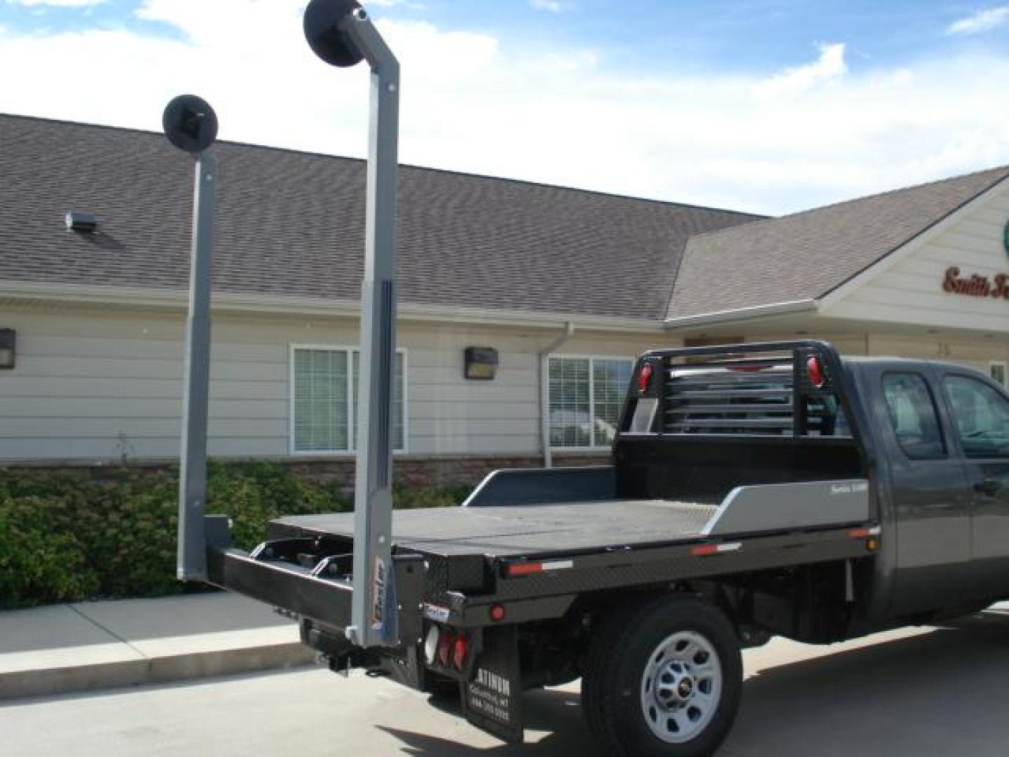 2025 Black Besler 3125 , located at 310 West 1st Ave, Big Timber, MT, 59011, (406) 860-8510, 45.833511, -109.957809 - BESLER ROUND BALE LOADER-FEEDER - 7 GPM ENGINE DRIVEN HYDRAULIC PUMP or 12 VOLT ELECTRIC/HYD POWER UNIT AVAILABLE. STANDARD FEATURES: SYNCHRONIZED PIVOT ARM OPERATION, DUAL LIFT CYLINDERS, 30K GN HITCH, LED LIGHTS, 11 GA DECK, 7 ROUND TRAILER PLUG, REAR RECEIVER HITCH, RUB RAIL, STAKE POCKETS, SID - Photo#18