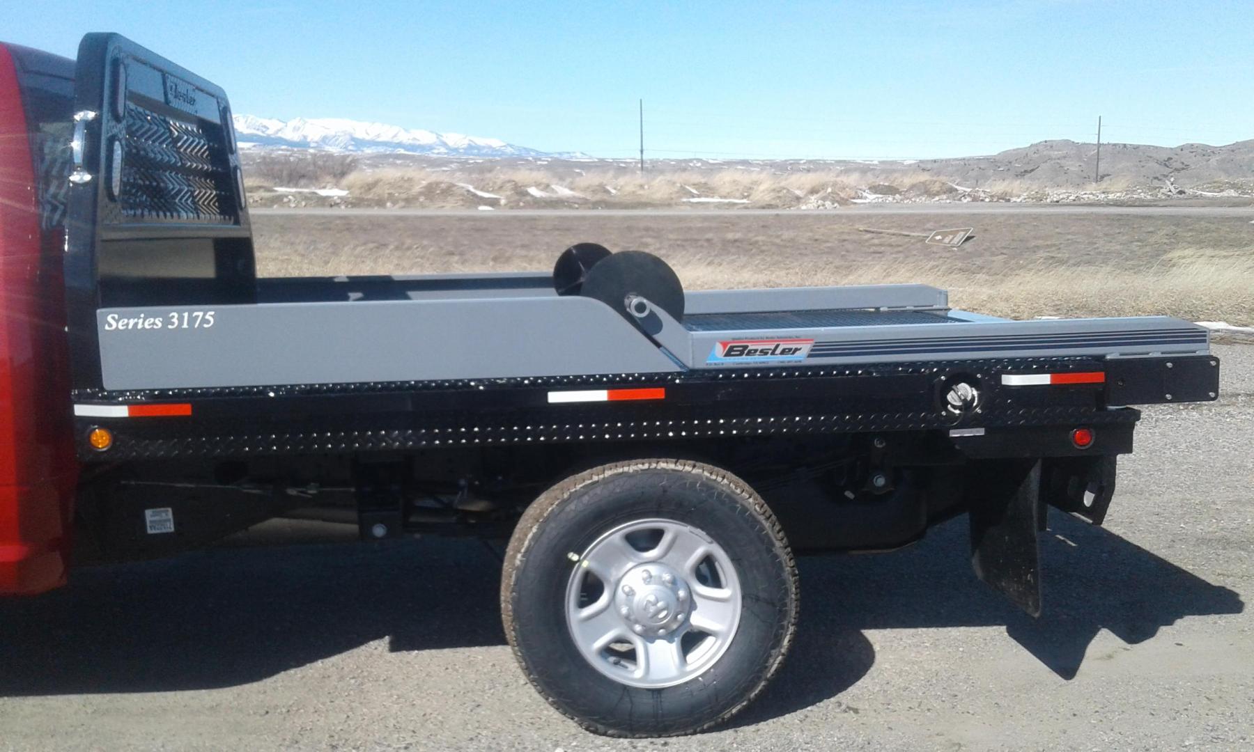 2025 Black Besler 3125 , located at 310 West 1st Ave, Big Timber, MT, 59011, (406) 860-8510, 45.833511, -109.957809 - BESLER ROUND BALE LOADER-FEEDER - 7 GPM ENGINE DRIVEN HYDRAULIC PUMP or 12 VOLT ELECTRIC/HYD POWER UNIT AVAILABLE. STANDARD FEATURES: SYNCHRONIZED PIVOT ARM OPERATION, DUAL LIFT CYLINDERS, 30K GN HITCH, LED LIGHTS, 11 GA DECK, 7 ROUND TRAILER PLUG, REAR RECEIVER HITCH, RUB RAIL, STAKE POCKETS, SID - Photo#4