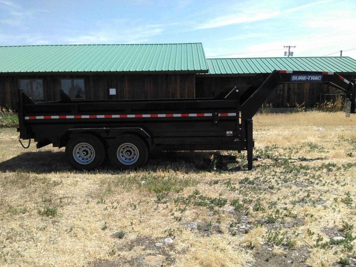 2025 Black SureTrac 7 x 14 GN LoPro Dump , located at 310 West 1st Ave, Big Timber, MT, 59011, (406) 860-8510, 45.833511, -109.957809 - Photo#0