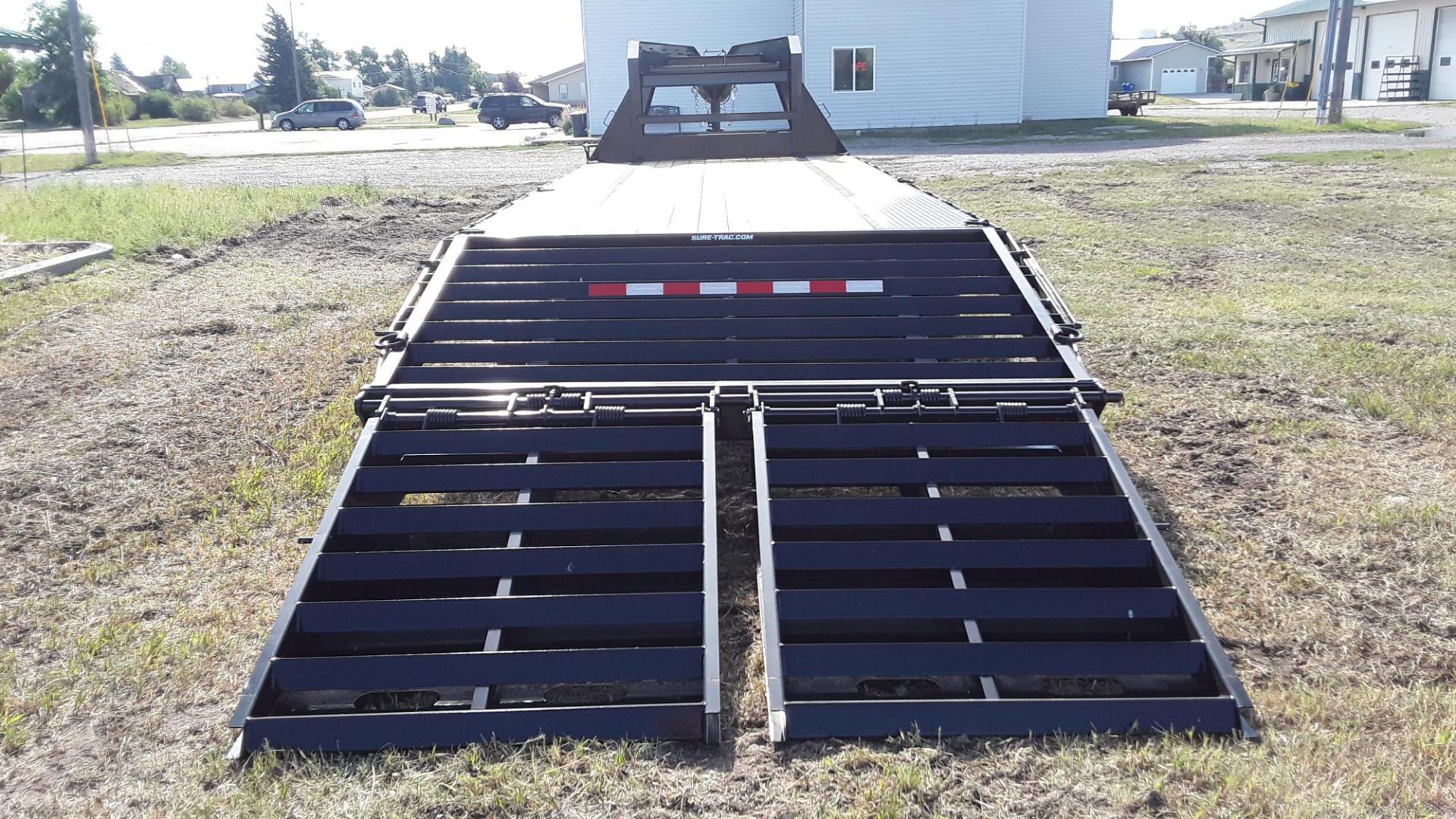 2025 SureTrac 81/2 x 25 GN Deckover , located at 310 West 1st Ave, Big Timber, MT, 59011, (406) 860-8510, 45.833511, -109.957809 - SureTrac 81/2 x 20 + 5 GN Deckover, 15K GVW, HD slipper spring suspension, EZ lube hubs, electric brakes both axles, LED lights, 16"-10 ply radial tires, 2x6 treated wood deck, (2) 12K drop leg jacks, (2) speed jacks, center mounted lockable tool box, rub rail, stake pockets, chain spools, 3" c-chan - Photo#5