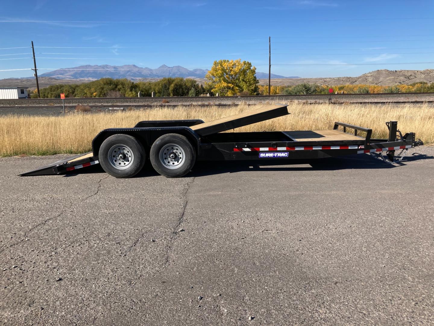 2025 SureTrac 7 x 16 + 4 Equipment Tilt , located at 310 West 1st Ave, Big Timber, MT, 59011, (406) 860-8510, 45.833511, -109.957809 - New SureTrac 7 x 16 + 4 Equipment Tilt, 14K GVW, 16' tilt - 4' stationary deck, 6" c-channel and tube frame construction, 6" c-channel full wrap tongue, 3" c-channel crossmembers on 16" centers, HD slipper spring suspension, EZ lube hubs, electric brakes both axles, 2 x 6 treated deck, 12k drop leg - Photo#6