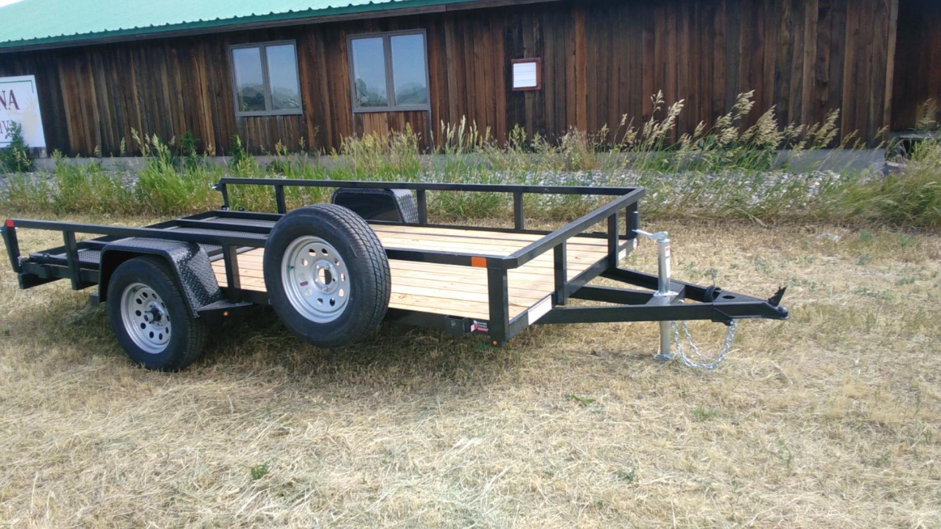 2024 SureTrac , located at 310 West 1st Ave, Big Timber, MT, 59011, (406) 860-8510, 45.833511, -109.957809 - SureTrac 7 x 12 Tube Top Utility, 3k GVW, 15" radial tires, easy lube hubs, 2" x 2" top tube rail, tube uprights, tread plate fenders, spare mount, fold flat rear gate with spring assist, treated 2 x 6 wood deck, wiring enclosed in tubing, LED lights, powder coat finish. Trailer pictured with option - Photo#3