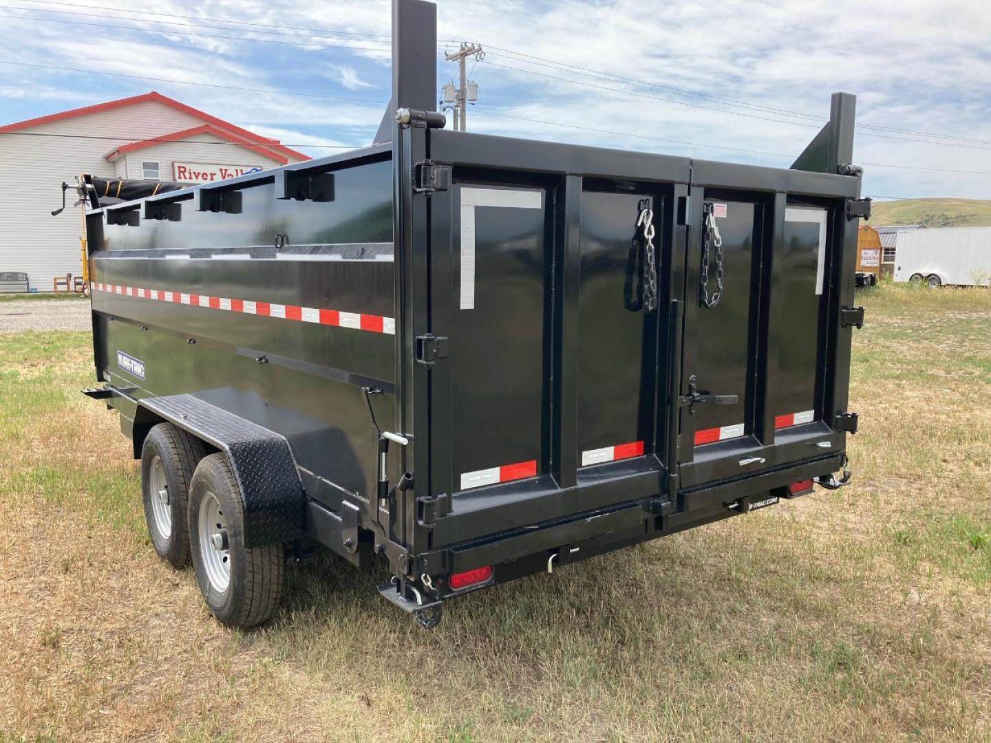 2024 SureTrac 7 x 16 LoPro dump - 14K GVW , located at 310 West 1st Ave, Big Timber, MT, 59011, (406) 860-8510, 45.833511, -109.957809 - SureTrac 7 x 16 LoPro Dump, 14k GVW, 4' side walls, telescopic hoist, HD slipper spring suspension, 16" - 10 ply radial tires, ez lube hubs, matching spare tire, mesh tarp, 110 volt battery charger, set back 12k drop leg jack, (5) D-ring tie downs, 10 ga floor, all LED lights, rear stow ramps, HD ma - Photo#2