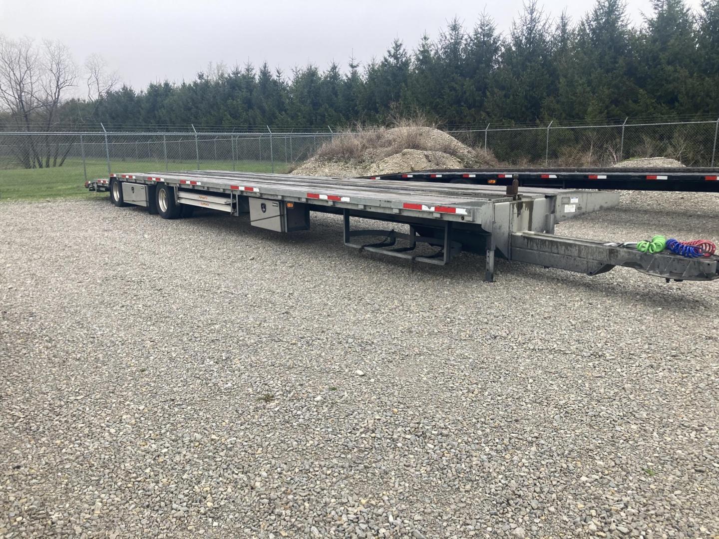 2019 , located at 310 West 1st Ave, Big Timber, MT, 59011, (406) 860-8510, 45.833511, -109.957809 - 2019 MO 43' Stinger trailer, 50K GVW, air brakes, tire inflation system, 245/70R-17.5-16 ply tires, alloy wheels, galvanized frame, wood deck, aluminum ramps, (3) toolboxes, hydraulic rear tail extension, center rail for securing trailers, spare tire holder, stake pockets, rub rail, LED lights, spre - Photo#2